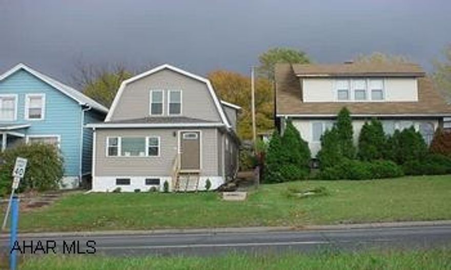 Completely redone! New Showcase kitchen with ceramic tile floor, Pergo in Dining Room, new carpet, roof, electric, siding, drywall, windows, new bath, gutters, soffitt and fascia.