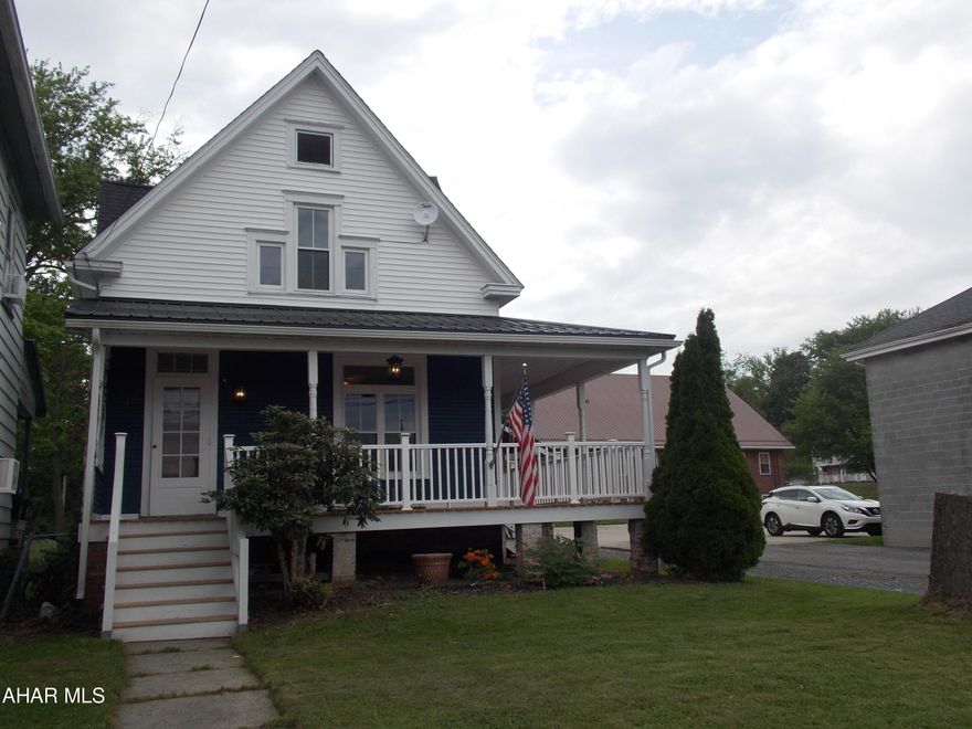 The Sellers have worked a couple of years bringing this home back to life.  You will love the new wrap around porch,  this is a perfect place to add a swing or a few rocking chairs.  The beautiful front door has been refinished and will make a great first impression. Walking around the other side of the porch you will find a brand new entry door and screen door. The first floor has been gutted and now features an open floor plan.  There is a fireplace in the familyroom  it is not functioning, but it will make a great focal point for decorating. The kitchen has beautiful new cabinets, sink and granite counter tops. All of the light fixtures are new and so are the appliances and floors. Included is a movable bar with seating and storage. There is a remodeled bath on this level as well as a laundry closet so no more going to the basement to do laundry. 
Upstairs is a lovely new bath with ceramic tile floors a beautiful new soaking tub and new sink and toilet. The carpet on the steps, hall and bedrooms is brand new. 
All of the knob and tube has been removed and a new 220 breaker box was added. Every window but one has been replaced, the house roof was replaced in 2020 and the porch and carport roof was replaced in 2022. A new gas boiler and water heater were installed in 2019 and PEX plumbing in 2019-2023.
So much of the work is done now a new owner just needs to add their touch. A full list of upgrades included with the listing.
Call to schedule a showing ASAP!