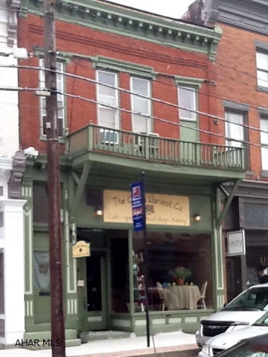 If you have ever dreamed of opening a restaurant in a quaint historical town, then this incredible business is for you. It is a turn-key operation which has made money since the day it opened its doors. The business is very well established in the historical district of Bedford. The Green Harvest Restaurant also has its own product line and offers a great catering business as well,  Growth potential is amazing as space is available on its upper (w/original high ceilings) and lower floors (w/stonewalls). Seating for 40, kitchen, food prep area, business office, stock and storage room and two half baths round out the 1st floor. The upper floor is presently rented as a 3BR apartment, lower level used for storage. View on You Tube.