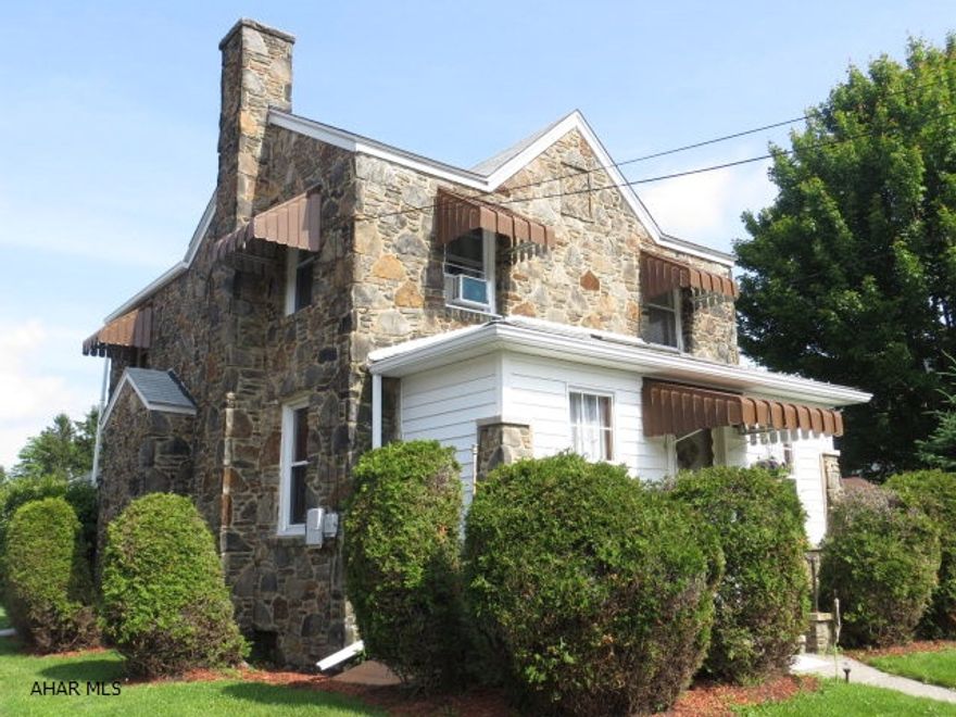 Stone exterior with original wood trim and fireplace makes this cozy home stand out with character. Spacious kitchen, dining and family rooms. Great closed in front and back porches for year round enjoyment. Nice size yard w/shed and garage. An absolute MUST SEE for those who appreciate Gallitzin history!