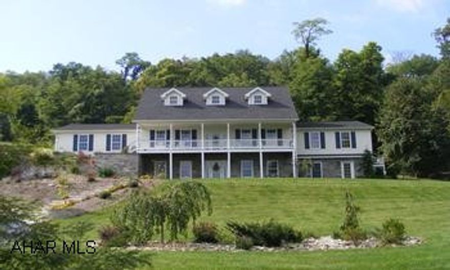 Gorgeous home, tremendous view! All on 1.196 acres. Lovely hardwood floors, 1st floor Master Suite, Great Room with cathedral ceilings and stone wood burning fireplace. Kitchen with maple cabinetry, granite countertops and large island. 3 car garage, terrific front porch and back porch and pond. Additional lot can be purchased. Call Dianne 329-1856.