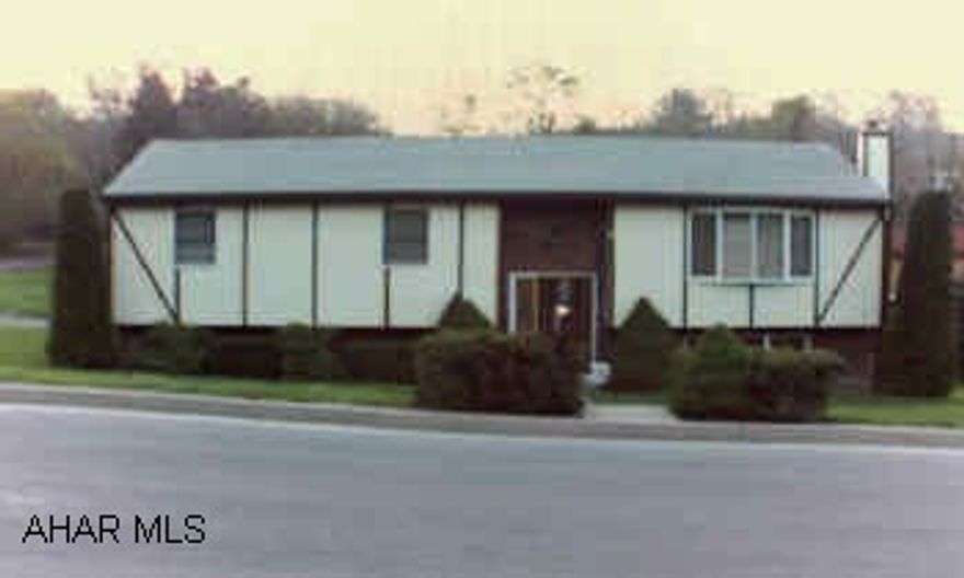 Brick and stucco bi-level. Newly refurbished kitchen, woodstove in family room.  House is in A-1 condition.