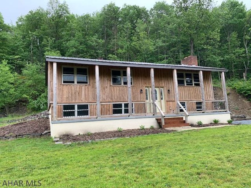 Complete seclusion yet close to town!! This home has been remodeled in the past 10 years with newer roof/windows/hemlock siding/baths/kitchens! Finished lower level with bedroom and large family room. Call today to schedule a showing.