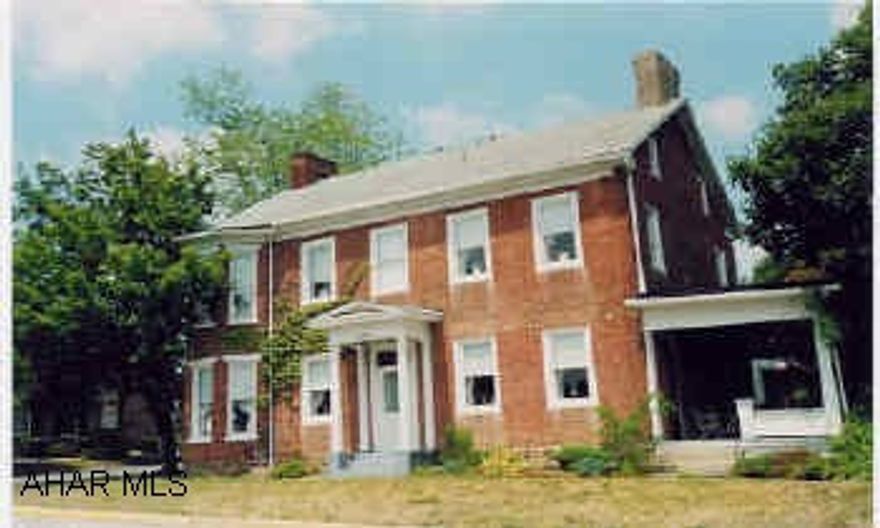 2 story 1800's brick. 5 bedrooms, 3 baths Historic federal style 2 story home built in early 1800's. Foyer, 5 BR, 3BA, spacious living room, dining room, kitchen, washer/dryer,summer kitchen. Other features include 8 fireplaces, ceiling fans, whole house fan, 3 porches, grainery, 2 cellars, walk-up attic, 4 out-buildings, including smokehouse. House sits on .4 acre corner lot on main street. Great opportunity for business and/or home.