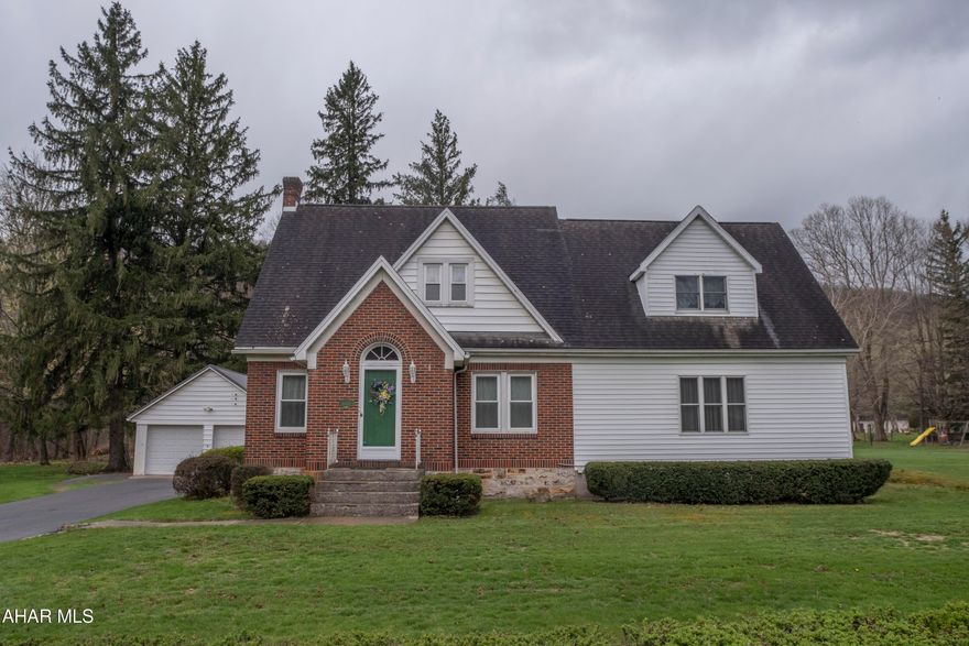 This beautifully maintained one-and-a-half story home sits on 1.14 acres and offers an exceptional blend of space, comfort, and charm. With three bedrooms and multiple living areas, there's room for everyone to relax and enjoy.

Upstairs, you'll find 3 bedrooms with a spacious primary bedroom complete with a private master bath and an additional half bath for added convenience. The main floor features a thoughtful layout with a formal dining room, a welcoming living room, a second cozy living area, a full bath, a large den and a well-equipped kitchen. A dedicated laundry room and an attached two-car garage add to the home's everyday functionality.

Immaculately kept, this home showcases a mix of hardwood, tile, and carpet flooring throughout, giving each space its own distinct feel while maintaining a cohesive style. Step outside and enjoy the serenity of the expansive lot with a covered back porch perfect for outdoor entertaining, gardening, or simply soaking up the peaceful surroundings. Schedule your tour.