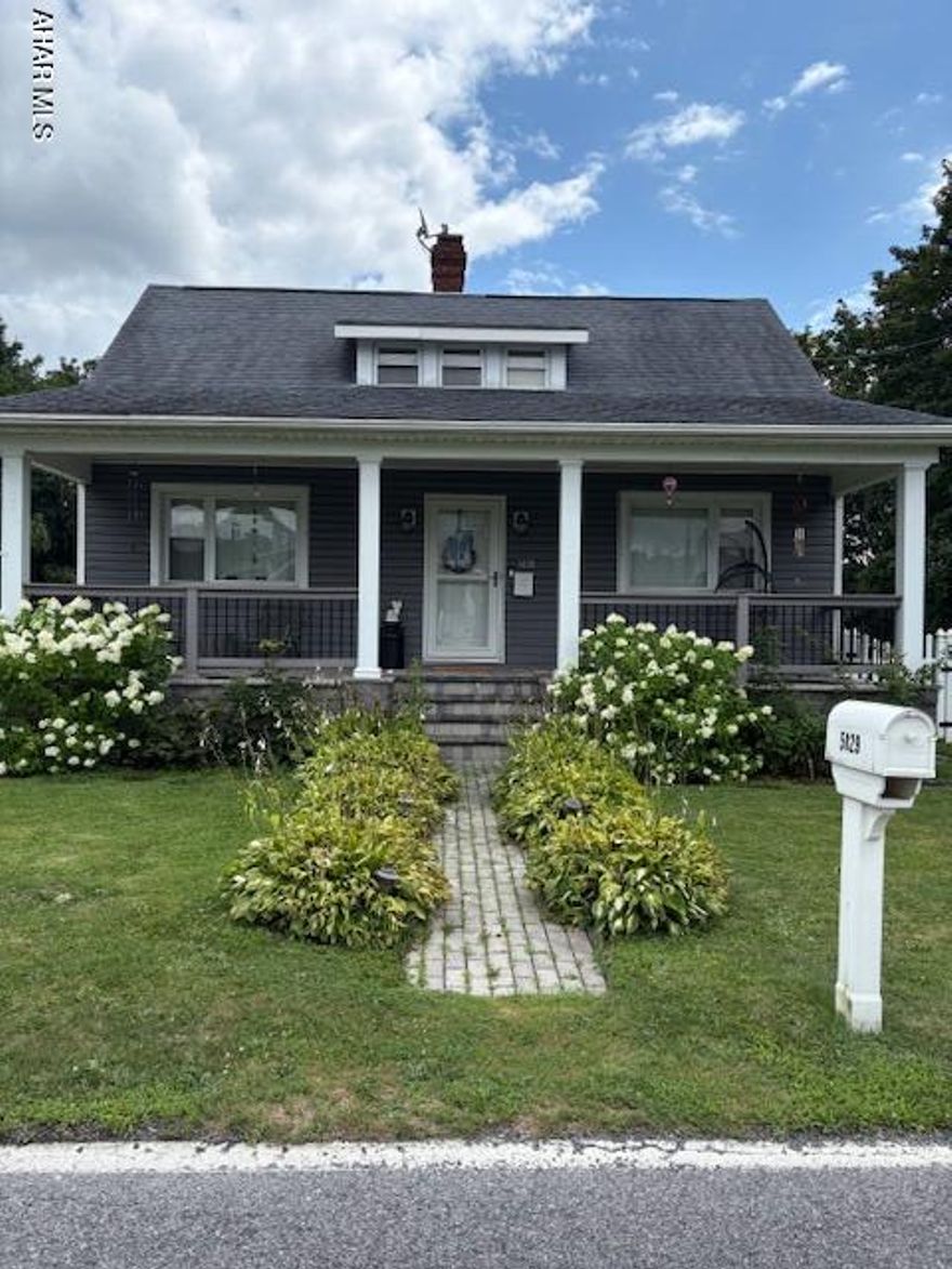 Welcome to 5029 Kissell Ave- A Classic Cape Cod style home ,offering 3 bedrooms and 2 1/2 bath. This beauty has a main floor bedroom & Bath. Enjoy your evenings out by the fire pit area. Fenced in rear yard ,with above ground pool. Partially finished basement with a bar.