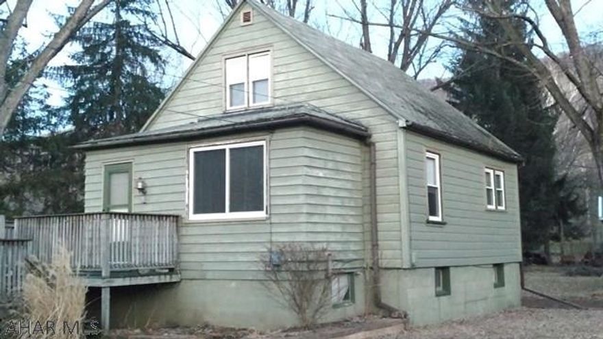 Cute, cozy 2 BR, 2 story-needs some TLC, but still a good opportunity to own your own home for very little money - Great Starter! Spacious living room, 1st floor laundry, updated windows, nice back yard, carport. Seller says property being sold " As Is".  Call Listing Agent for an appointment.