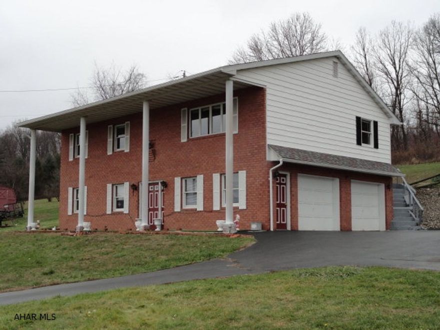Beautiful 4 bedroom home with a million dollar view. New carpet and flooring newly painted  new radon system installed. Finished basement complete with in law sweet with kitchen, living room, bedroom and private entrance. View this beautiful home soon this one will go fast