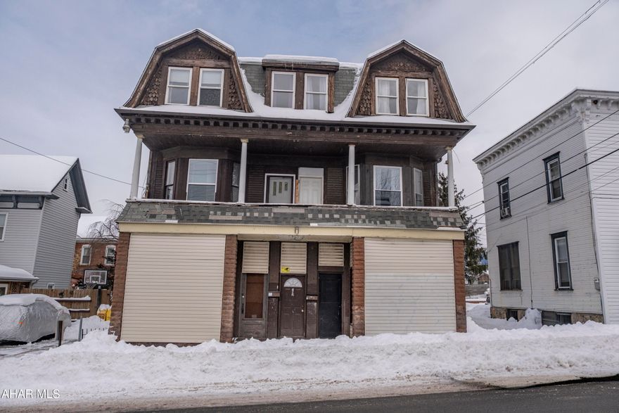 This versatile triplex offers strong potential for investors. At one time, the first floor was used as a commercial storefront. This space is now ready to be reimagined and updated. The second floor features two well-maintained residential units, each offering three bedrooms and one full bathroom. Both units have been well-maintained and provide comfortable, functional layouts. Additional highlights include separate gas and electric utilities for each unit, making this property ideal for maximizing rental income and minimizing owner expenses. Conveniently located in Altoona, this property presents a solid opportunity to add value and build long-term returns.