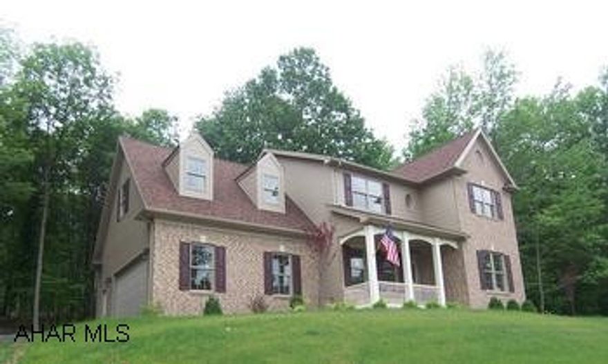 New construction - Beautiful hardwood floors throughout first floor.  Spectacular birch cabinets.   Bay window in kitchen looking out to wooded lot.  Master bath includes whirlpool bath and tile floors.  Seller will consider trade on buyer's existing home.