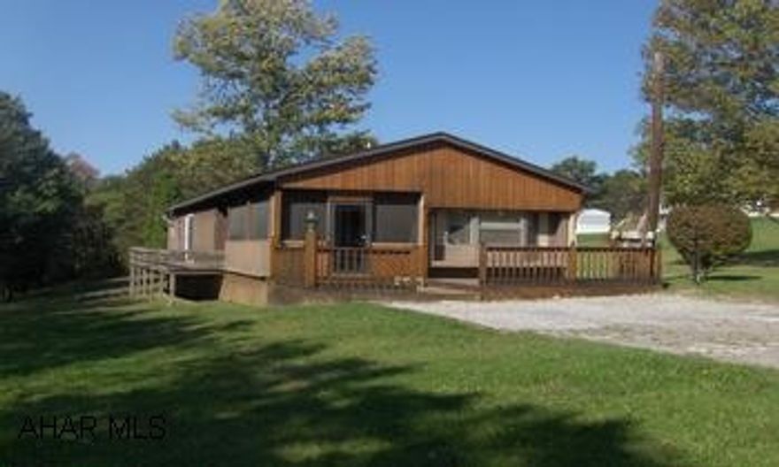 One story mobile home/LO. Two bedroom and one bath. Nice size lot. Beautiful home, large living room and kitchen, wrap around deck, 2 bedroom and 1 bath. Great starter home.