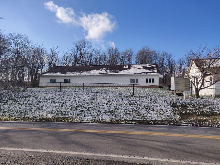 Excellent One Story Building that previously served as a School and Fellowship Hall. Could be used for Day Care, School, Fellowship Hall, Office Space, Retail, Medical/Dental Office or Other Use. Fully Functional Kitchen, Very Large Conference/Dining Room, 3 Large Rooms that could easily be separated into 6 Rooms, Restrooms, and Parking. Property includes a separate old Church Building and Other Building that could be used As Is, for storage, be remodeled, or be torn down for added parking. Will likely need Zoning Approval for Specific Use. Property is currently Zoned Suburban Residential with a Special Exception currently for Use as a Church/School. Taxes will be Reassessed at Change of Use.