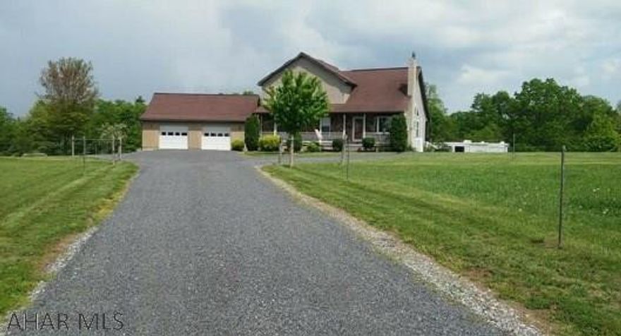 This property has it ALL. Fenced pasture/yard make up 10 acres w/ the rest wooded w/ATV trails, stream and park-like setting. Driveway wraps around the home, 2-car garage and a large 30x70 bldg that has electric/water. Rear of home boasts a new 12x42 deck and an outside pavilion that is an outdoor haven! Swings, picnic tables, unique lights, outside sink, a working BR and a water fountain. Open concept to the home includes the kitchen/dining/living room that have been painted w/neutral colors. 2 main level bedrooms, full bath w/ new tub/shower stall, laundry and mudroom. Loft overlooks the living room and gas fireplace. Master BR on 2nd level has a huge walk-in closet, master bath w/ dble sink, shower and jacuzzi. Full finished basement 2nd laundry area, family room and wood stove.