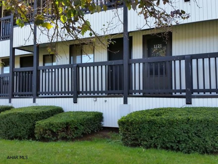 Very nice 2 bedroom, 2 bath first floor Blue Knob condo. Seller has updated kitchen, bath and added shelving, newer appliances, newer carpet, parquay flooing in kitchen and baths. Located across from outdoor pool. Back screened balcony off living room. Enjoy Blue Knob ALL 4 SEASONS! Indoor & outdoor swimming, skiing, golfing, tennis & hot tubs!   J-311  $235.00 is the monthly association fee.