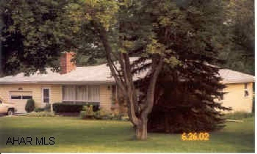 Large Ranch, with an acre lot, needs paint on interior, lots of potential. Hardwood under old carpet, large 3 BR. Ranch.  Dishwasher does not work.