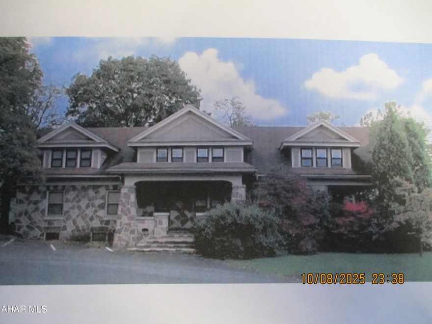 Welcome to Pine Stone Estates, nearly 4 acres of gently sloping land.   The original two story building known as the Manor House was constructed in 1938,  and contains 4150 sq. ft.  It is comprised of offices on the first floor with two 1000 sq. ft. apartments on the second floor.  Currently occupied by two small businesses, the first floor is easily converted for single occupancy.  There is a private exterior entrance to the second floor apartments.  This building is surrounded by paved parking for 18 cars plus a two vehicle carport for the apartment tenants.

Constructed of cut native red and tan sandstone, the interior boasts hand crafted woodwork and doors of native black walnut and blonde oak.  The first floor and basement are serviced by two gas forced hot air furnaces and central air conditioning units.   The apartments are heated with hot water radiators.   Window A/C units are needed.

The second large building identified as the Carriage House, is constructed of the same native sandstone and contains two floors of office space, each approximately 1000 sq. ft.  This building also features separate forced hot air furnaces and central air conditioning units.  Each floor features modern office space with two restrooms.  There is an interior entrance to the second floor as well as a private exterior entrance.  This building is easily converted to a single user.   Private paved parking surrounds the building.

A third building of frame construction is a stable with six horse stalls but it needs to be repaired.   It has electricity and water but is unheated.

Full address is 1716-1720 Plank Road.