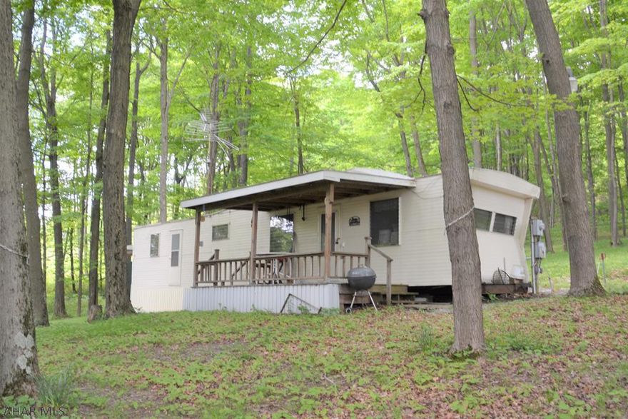 Outdoorsmans delight! A perfect getaway up in the mountains bordering Gallitzin State Forest. Current owners use property for an equestrian camp. Property has a horse barn with two stalls and fenced in area ready for your horses and is located minutes from Chestnut Ridge Horseman's Club.