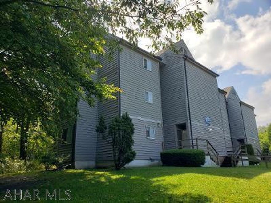 YES :) THERE IS AIR CONDITIONING :) Newer mini-split AC/Heat unit. 2nd-floor studio condo with alcove bed, electric fireplace, balcony & nice laminate flooring! Electric breakers. HOA $255/mo includes: road & outside maintenance, indoor & outdoor pools, hot tub & tennis court usage. (Golfing & skiing for a fee) J-518