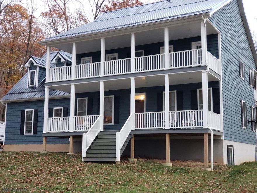 Nestled in the woods, this custom built 4 bedroom 4 bath home  sitting on over 10.5 acres, in Spring Cove school district is a must see. A nice open floor plan on the first floor is perfect for all entertaining needs. The kitchen is open to a beautiful family room and doors to the deck. Large bedrooms with alot of storage complete the second floor. The master suite is large with a private bath, walk in closet  and two doors to a private covered deck. The fourth bedroom would make a perfect guest bedroom with a full private bath and double closets. The 10.56 acres has endless possibilities.  Currently the land is used for horses and livestock and can be timbered. Call listing agent for more information and your private tour.