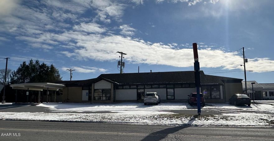 First let's talk about location.  With a daily traffic count of more than 15,000 cars per day, this property is located on one of the busiest stretches of road in Blair county. 

Second, this building offers a variety of uses.  It is zoned commercial and can be used as both office and/ or retail space.  Building provides 2 spaces one most recently used by a bank (currently vacant) and the other currently being used as office space. Property has plentiful parking and visibility making it an excellent spot for any business venture.  

Lastly, it has great income potential for our investor friends.  Great location, great property, excellent income potential.  It's a trifecta!