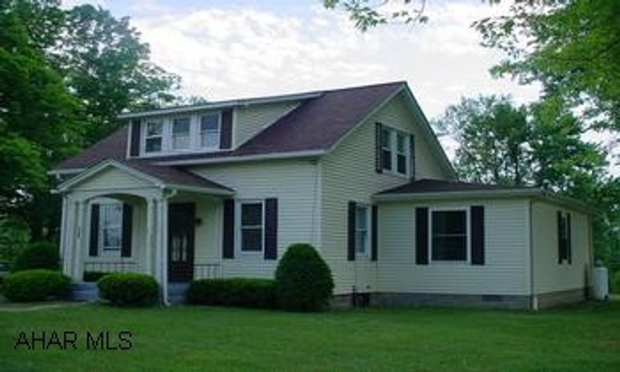 Agents - call for appointment.  Home is occupied. Charming 3 or 4 bedroom in Hollidaysburg School District.  First floor master bedroom with 3/4 bath and laundry room.  Replacement windows, newer roof and furnace.  Lovely 1.11 acre lot with mature trees.  Covered porches.