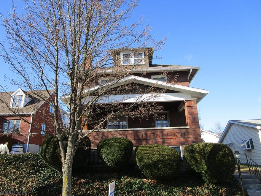 BRAND new price!! Duplex OR not...... you choose...Very well maintained spacious brick home awaits new owner!  This home is situated on a double (FLAT) lot in the Calvert Hills section of Altoona. Living room is not only spacious but has a wood burning fireplace to take the chill off!!!   Updated mechanics to include a newer "Bosch" boiler and newer hot water heater.  Also insulation was done at the same time - so don't be bogged down w/high heat bills.  There is a separate outside stair access to 2nd floor - which could be used for tenant - 2nd floor also has a kitchen which could be removed to make additional bedroom.   The attic is also heated and could easily be another bedroom.  1 1/2 Car detached garage.  Call listing agent to tour this lovely home