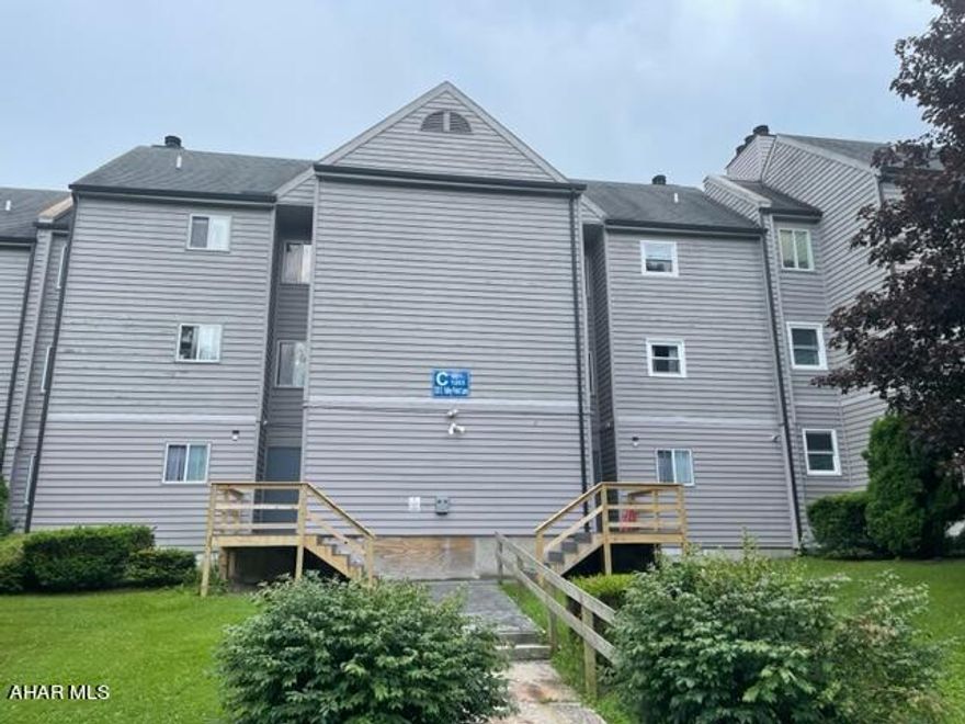 Here is a fully furnished and updated condo unit with new flooring, carpeting, and sliding door to the private deck.  Window World just installed 2 double hung windows. There's a fireplace to keep you warm on those chilly winter nights.  This unit can comfortably sleep up to 6 people and has a vaulted ceiling, spiral staircase, and free onsite parking.   And you can walk to the indoor pool and hot tub as well as The Club House Bar and Grille, outdoor pool. and tennis courts.  Blue Knob features the highest skiable mountain in PA and has so many amenities to offer: golf, pickle ball, hiking trails, and, of course, SKIING!  There's plenty to do as your private getaway vacation, whether it be a weekend or a week.  Check out WWW.BlueKnob.com for a schedule of planned activities.  HOA is only$290 a month and that includes all of the maintenance and facilities.