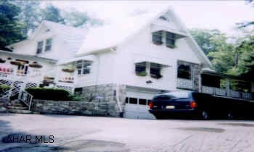 3 LOTS.  LOADED WITH CHARM AND CHARACTER. THIS 4 BEDROOM IS TUCKED IN A HILLSIDE WITH AN UTTERLY PRIVATE .96 ACRE LOT FOR THE LOVELY INGROUND POOL. ALL MECHANICS UPDATED. SECURITY!  HOUSE IS VACANT. USE DEAD BOLT ONLY. DO NOT LOCK KNOB.