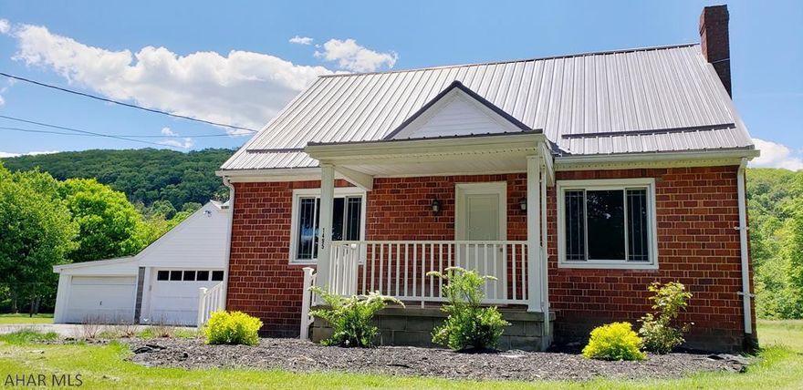 Well maintained 1 1/2 story home in Hollidaysburg School District with beautiful mountain views and a stream at the rear of the property! Roof & windows replaced, new front door, and updated porches all in the last 3 years. Updated 200amp electric. Interior freshly painted and original hardwood floors just refinished! 2 bedrooms and full bath on main floor. Stairs to a large unfinished 2nd floor that could be used to create a master suite or additional bonus living space. Full clean and spacious unfinished basement. Laundry area in basement includes washer, dryer, and utility sink. Large flat lot with several shade trees. Close to walking trails and State Gamelands.