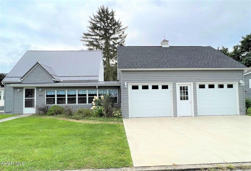 Charming cape code home situated just blocks from historical downtown Bedford and less than one mile from the Omni Bedford Springs Resort. The main level features an entry foyer, living room, kitchen, dining room, bedroom, a full bath and laundry room. Second level has two bedrooms and another full bath. Large front sunroom for relaxing and rear enclosed screen porch. Two-car attached garage with full second level loft for a workshop or storage. Full basement with integral garage, combination furnace of either oil, wood or coal, mini split heat pumps with air conditioning and updated 200-amp electric. Great location and move-in ready!!