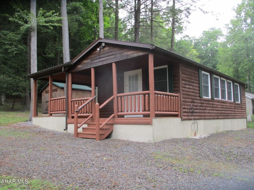 Is this a getaway or a place to live full time?  Only you can decide!  Two bedrooms, one bath with washer / dryer hookups.  Full kitchen and living room with lots of windows to watch the deer.  Relax, or work, out on the spacious deck while enjoying the outdoors.  Electric baseboard heat.  
Come take a look for yourself.