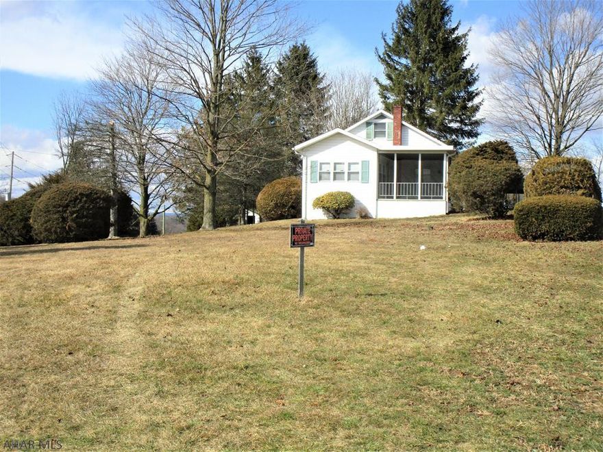 Cozy 2-bedroom with lovely, heated, "Florida" room addition (2000+-); relaxing screen.-in porch; freestanding carport. Kitchen & bath were updated (dates ?).    Seller will be leavinge remaining items in basement, storage shed, outside water hose & trash can.   Well on prop + underground heating fuel tank.  Bedford Twp. water & sewer; Penelec / First Energy electric provider; SAC oil supplier. ? Cable ?  Sunset Lane is shared, privately-maintained road (maintenance agreement, if any, unknown)..  Seller will NOT accept an offer with USDA/Rural Housing, FHA, VA or PHFA financing; wants to sell "AS-IS". Electric panels observed are fuse-type. NO GUARANTEES on acreage, ages, GLA, maps, info,..