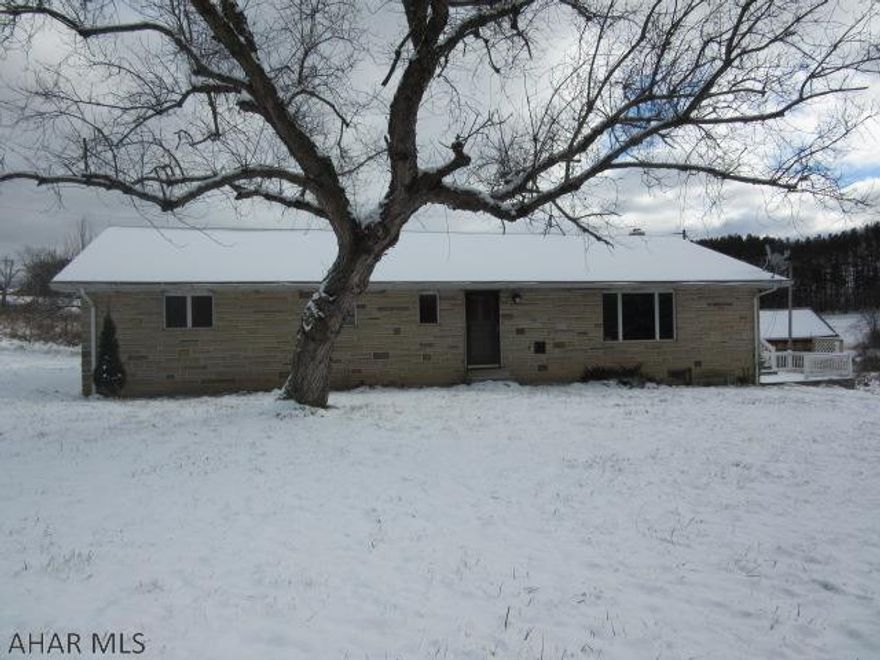11 acres with pond - Ranch home with huge rooms, handicap accessible, log cabin our building and concrete block out building, Due to the condition, the property may have health/safety risk(s). Prior to entry / access all parties must sign a Release and Hold Harmless Agreement and the property may only be shown by appointment. Property was built prior to 1978 and lead based paint potentially exits. This property may qualify for Seller Financing (Vendee)