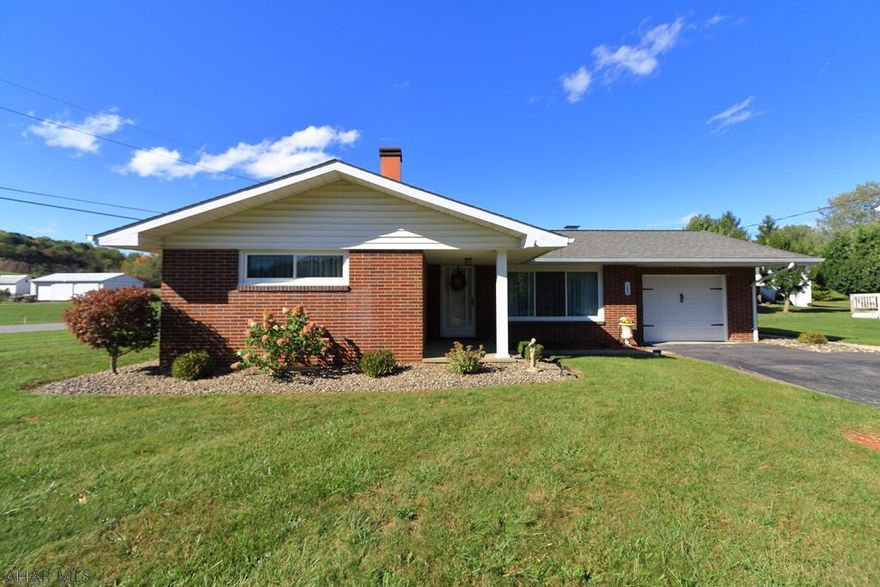 This mid-century home includes many updates that make it the perfect choice for just about anybody! This home includes 2 lots that total nearly half an acre. New hardwood floors in the large living area. Screened-in sunroom, open kitchen and dining area, and tons of storage space in the attic and basement. This move-in ready home could be for you - ask to see this home today!