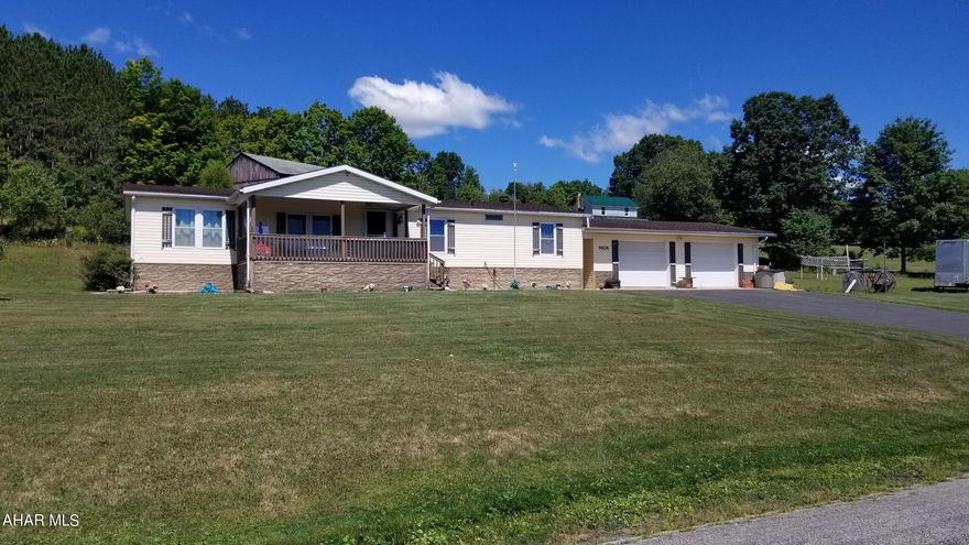 1 story living on over 1 acre with a great view of the valley. This home features 3 bedrooms, 2 full bathrooms 2 family/living rooms, and 2 large recreational porches (1 covered, 1 enclosed), and 2 car garage. Functional wood fireplace, spacious dining room, lots of cabinet space in the kitchen. Plenty of Storage!  The Master Bedroom has it's own ensuite master bath with a private wash room with stand-up shower, and leads to the master walkin closet. The home sits near-center of the large 1.125 acre lot. Laundry/utility room is just off the kitchen. Newer roof, furnace, and central air system! Call for your tour today!