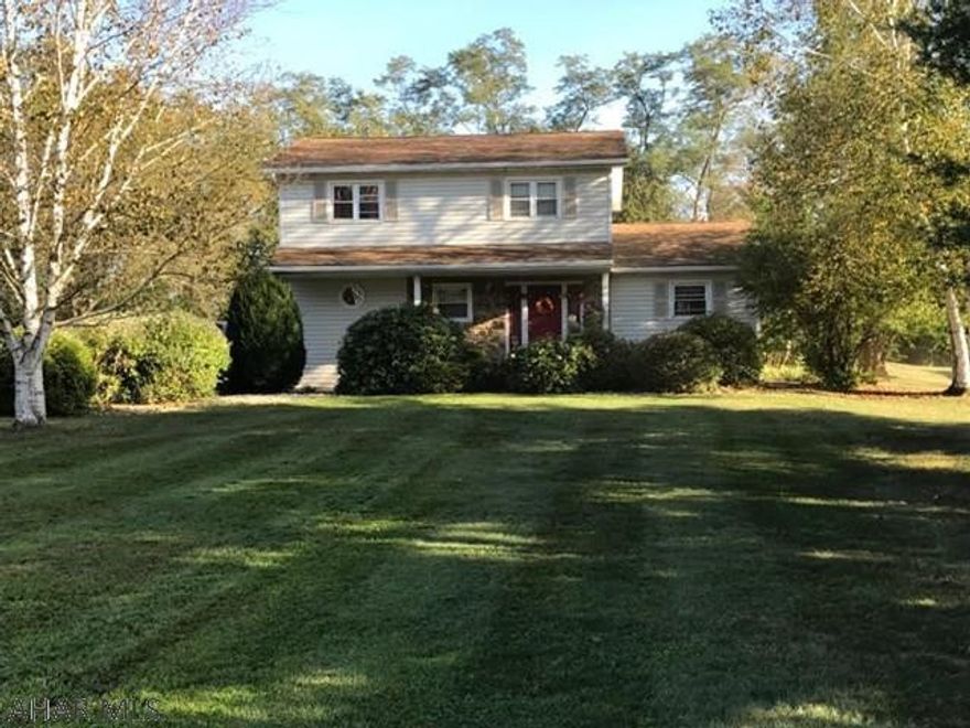 Looking for a beautiful home in the country?  Look no further!  This lovely 3BR, 1.5 Bath on 1AC halfway between State College and Altoona awaits you.  Eat-in kitchen, Dining room, Family room and unfinished basement.  2-Car detached garage.  New brick patio and rear deck.New Conventional Septic being installed and City Water.   New hot water heater.  Electric HP and Coal stove.