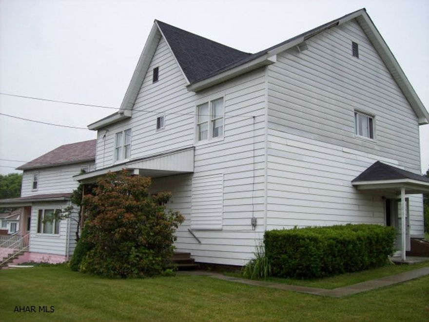 If you have a home business this is for you! Work downstairs and live upstairs. 3 bedrooms, 1 bathroom, living room, dining room, eat-in-kitchen, plus attic. Downstairs is 2 large rooms, plus laundry toom and dry walk out basement. 10 year roof, 10 year furnace.