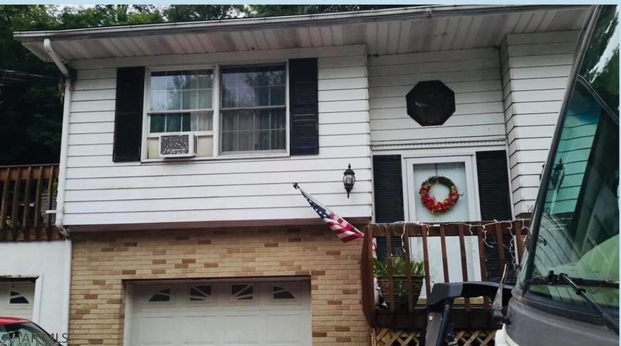 Nice split entry home on 1/2 acre. Great entertaining home! Room to move on the wrap around deck plus the large sun room. Open concept living area with large windows for natural light. Lower level has bedroom with 3/4 bath and entry to integral garage. Come check this one out for yourself!! Call for appointment!!