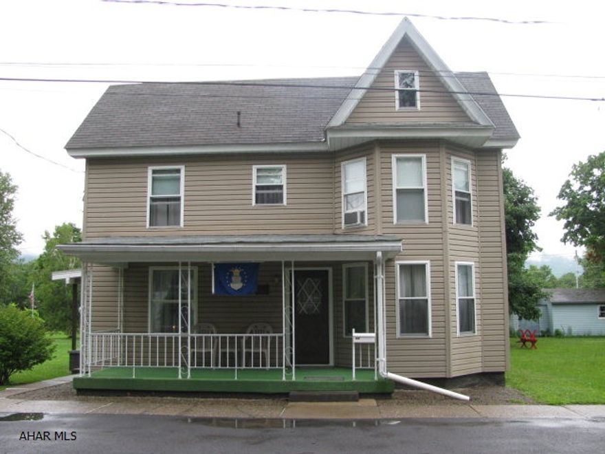 Immaculate  2 1/2 story vinyl sided Bellwood home on large lot! Spacious LR., DR., EIK., 1st floor laundry & 1/2 bath, plus 3 large bedrooms & updated full bath! 2 detached garages w/ space for 3 cars! 2 covered porches to enjoy summer evenings.