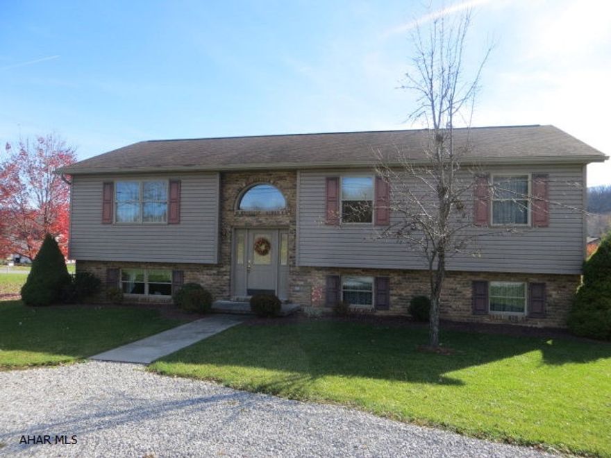 Immaculate, 3 bedroom, 2.5 bath home on .4132 acres of ground in a great development!  The property features an eat in kitchen, large living room and a completely finished basement that will make entertaining a breeze. The cook or baker will love the large, open kitchen area which is perfect for preparing that special dish. The bedrooms are spacious and include plenty of closet space and the master bedroom suite, with private bathroom, has plenty of room to unwind after a long day.  A beautiful covered deck is located just off the kitchen and offers a fantastic view of the mountainside.  The property also features a covered patio below the deck and just outside the basement family room. The garage has both heat and air, as well as an exhaust fan. This home is absolutely move in ready!