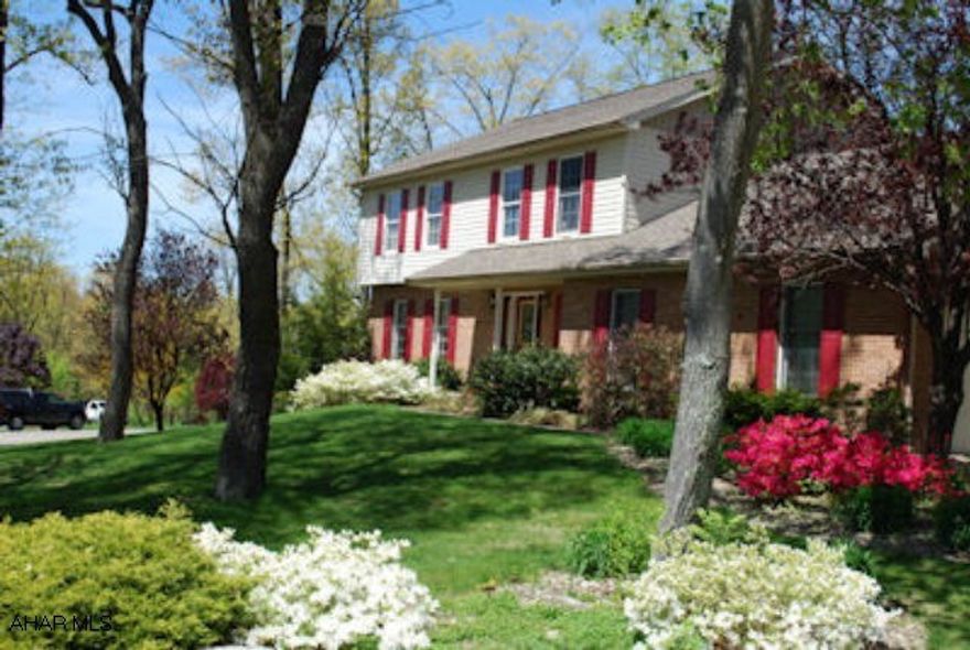 Beautiful two story in Sylvan East.  Large rooms - 3000 sq. ft.  Hardwood and Ceramic Tile floors.  First floor family rm w/wood burning FP and cathedral ceiling.  3 season sun porch.  Large corner lot with gorgeous landscaping.