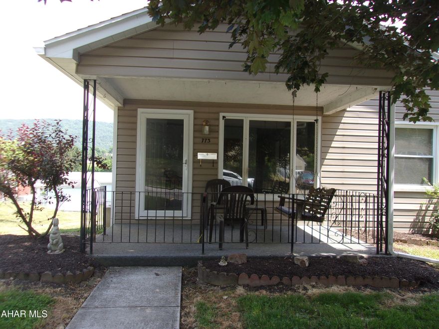 Starting out or downsizing!  Not too big, not too small, this 1100+ sqft ranch is just right. 
Located in a quiet neighborhood.  Nice front and side yard with mature landscaping.  Lovely covered porch in front w/ swing.  Enjoy your morning coffee or relax at the end of the day.
There is a small but serviceable kitchen with a separate dining area and pantry. Good sized living room with coat closet.  Three bedrooms and a full bath complete the main living area, which has oak hardwood floors throughout.
Full walkout basement and paved space out back for your summer furniture, firepit and grill.  Garage was originally in the basement, could be converted back.