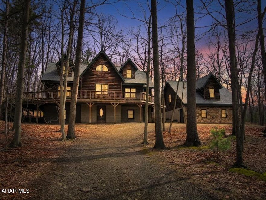 Log cabin on 20+ wooded acres. This would make a great vacation home! The log cabin and garage had a new roof installed in March 2026. There is a living area over the garage but is in need of repairs and has some water damage from before the new roof was installed. The road into this property is rough and very steep. When there is snow on the ground there may be no winter access. A truck will be necessary for showings or you will need to walk back the road. This property eligible under Freddie Mac First Look Initiative through 04/26/2026. Seller will only respond to owner occupant offers in this timeframe. Freddie Mac will not respond to investor offers during the First Look period.Buyer must pay 2% transfer tax.