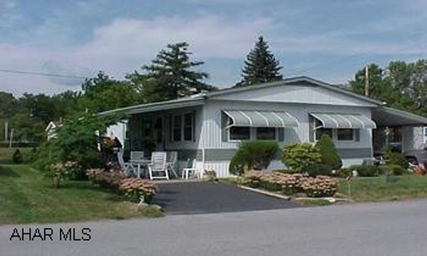 1973 Henli 24x56 - 1344 sq ft - Doublewide - Immaculate home - new windows, carpet, tile, guttering, shed, bath vanity, kitchen sink.  New central air unit!  Carport/patio.  Must see!! 1973 Henli 24x56 - 1344 sq ft - Doublewide - Immaculate home - new windows, carpet, tile, guttering, shed, bath vanity, kitchen sink.  New central air unit!  Carport/patio.  Must see!!