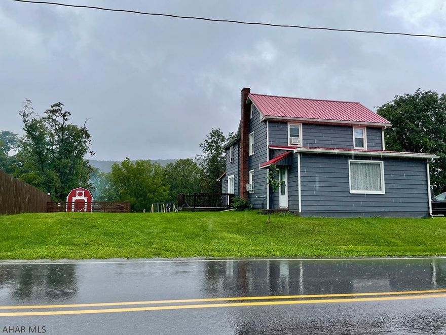 You are going love living in this adorable and updated home! The room sizes are fabulous... open kitchen/dining room with lots of cabinets and counter space. Open up the sliding doors to the deck and feel the breeze as you are dining or just eat outside! You'll be cozy in your huge living room all winter with the pellet stove and the kids can play in the bonus room right by you because it makes a great toy room(or office). The 3 bedrooms upstairs are good size and have great closet space. Bathroom is all updated too. OUTSIDE you'll find an animal house for baby cows, goats, etc. and a separate home fenced for the chickens , a massive flat yard to play in, a garage, and even a ready to be finished man cave! All of this with a new roof and mechanics updated last year. Don't miss it