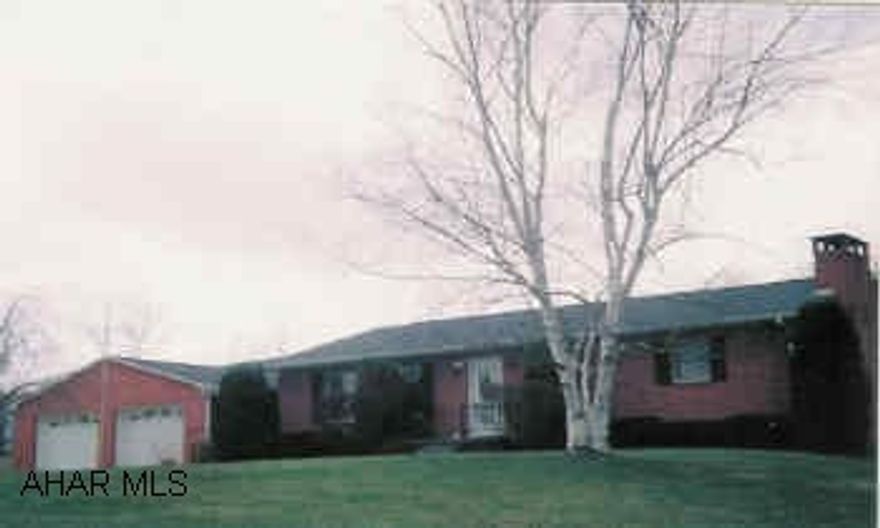 Lovely Brick Ranch Home with very nice yard, covered motor home carport, small barm.