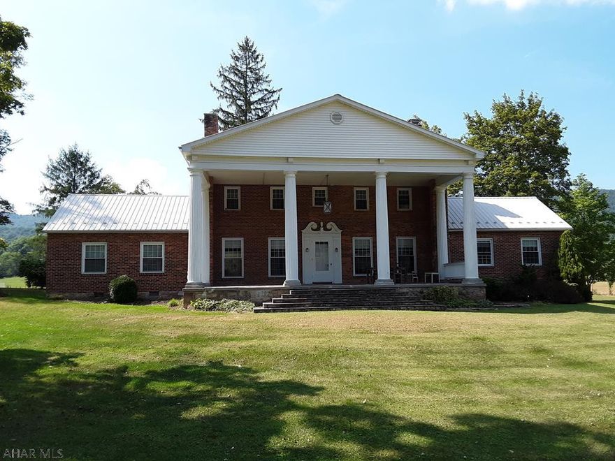 Located within a 10 min drive to Omni Bedford Springs and centrally between Bedford and Cumberland .  This gentleman's farm has a lot  to offer any buyer!  Stunning views of the surrounding  mountain ridges and state game lands!  This property offers privacy and amazing country living!  The Large Colonial brick home has stood the test of time and has been beautifully renovated with modern essentials!  The home has newly installed HVAC system.  The electrical was upgraded on the entire property and there is an LP backup generator in the event of power loss.  The grounds are amazing with a large remodeled bank barn,  large pasture for animal turn out,  plank fencing,  woven wire fence,  a large 2 bay heated garage, ice house, old log school house and a pond and a stream!
