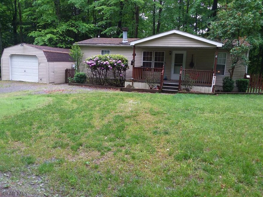 Cute two bedroom, 2 bath ranch with 1 car garage.