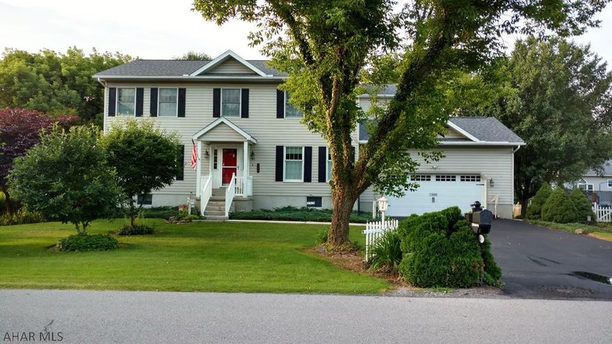 Fantastic spacious, one owner, 4 Bedroom, 2.5 Bathroom, 2 Car Garage, home located in Old Town Village Development close to Frankstown Elementary School. Improvements/updates in 2018; New Roof with Skylights, New Water System, New Basement Ceiling and Carpet, New Kitchen Floor, New Refrigerator, New Toilet (1st Floor Bathroom). Special features include but are not limited to; large open kitchen/family room area with fire place, french doors separating the living room/family room, a formal Dinning Room accessible from the kitchen as well as a walk out from the kitchen/family room area to a 15' 4"x 9'8" Sun Room and 9'8"x 7'6" Deck, Large 46'x26' Basement Area partially finished ready for new owner to add their preferences.  House also has a Radon Mitigation System and Central Vacuum System.