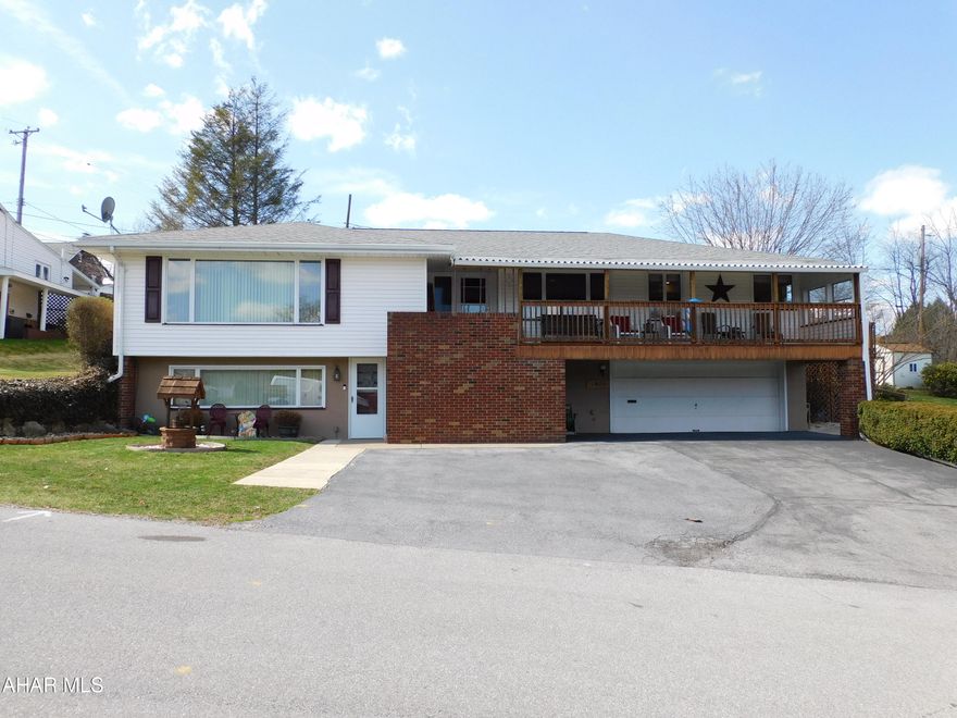 Fantastic home in Altoona! Charming eat-in kitchen that features a tile backsplash, plenty of cabinets, and slate appliances. Formal dinning room with hardwood floors. You will love the large living room that gives lots of natural lighting and has ample furniture space. Huge primary bedroom with 2 closets. Remodeled first floor bath! Original hardwood floors throughout most of the first floor. Gigantic finished basement! Finished  basement could make a great mother-in law suite or 4th bedroom. Integral garage and off-street parking. This home is great for outdoor entertaining! Huge 100x120  fenced-in yard, attached deck, and brick paver patio.  Only minutes from shopping and I-99. Extremely well-maintained. Don't miss out on this gem!